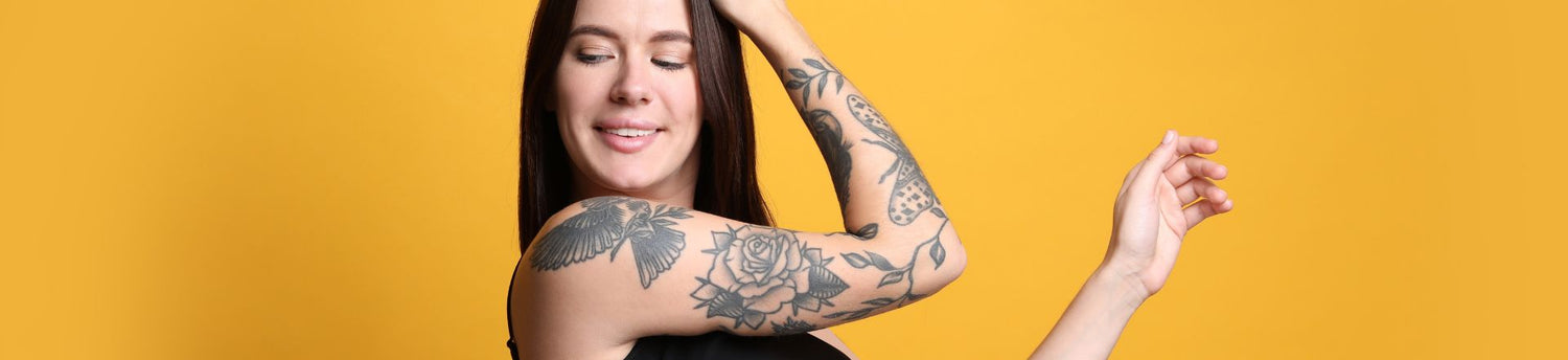 woman with temporary tattoo on her sleeve