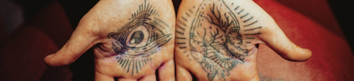 scary halloween tattoo a man's palm