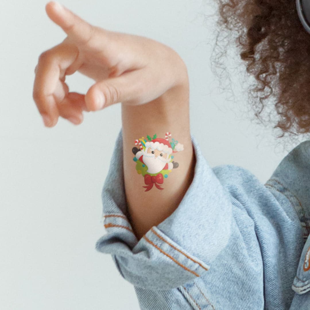 Jolly Santa with Bow Temporary Tattoo 2 in x 2 in