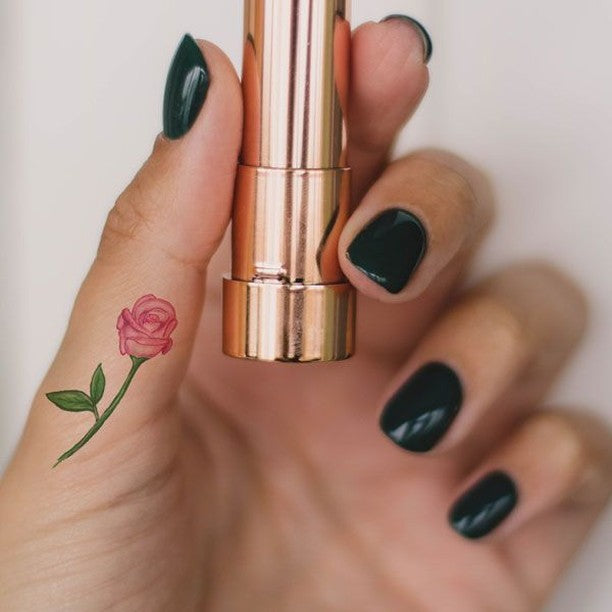 Tiny Pink Rose Tattoo