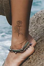 black rose tattoo on ankle