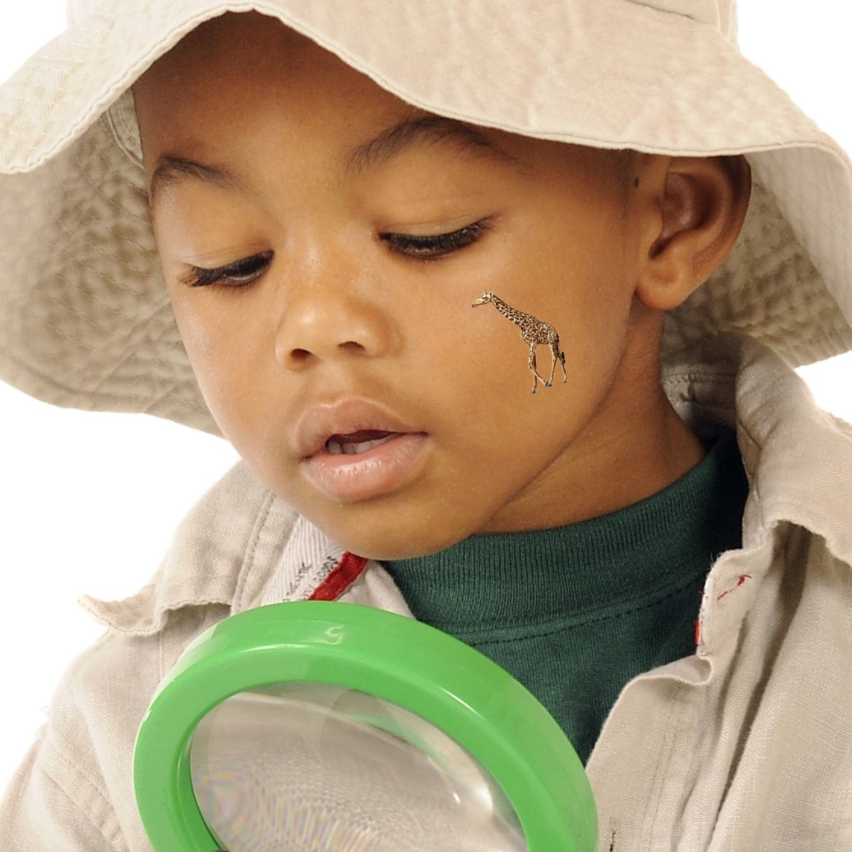 little boy with a giraffe temporary tattoo