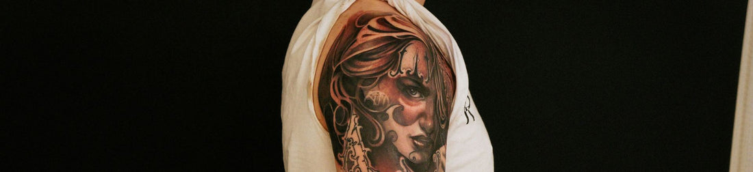 a man with full sleeve holiday tattoo