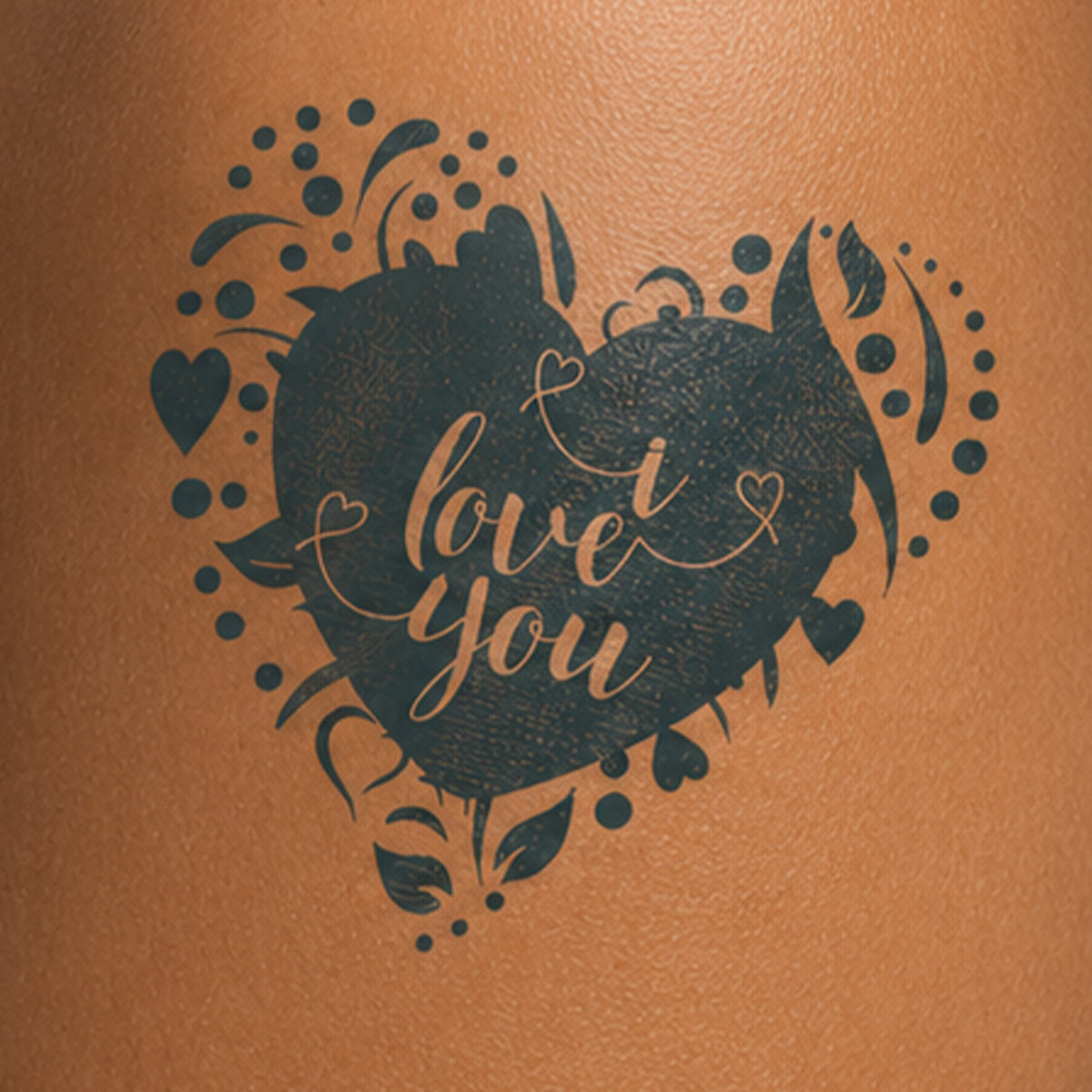 Heart-shaped design with 'love you' Tattoo