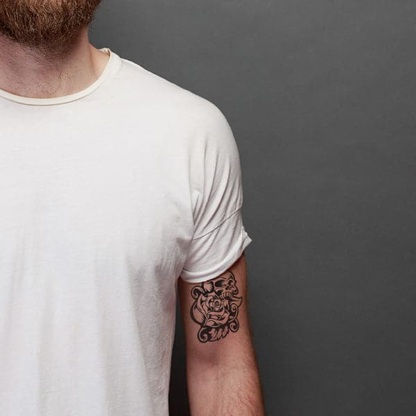 man with temporary tattoo on the inner arm