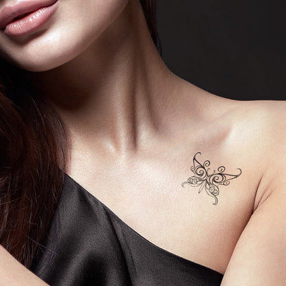 woman wearing black tribal temporary tattoo
