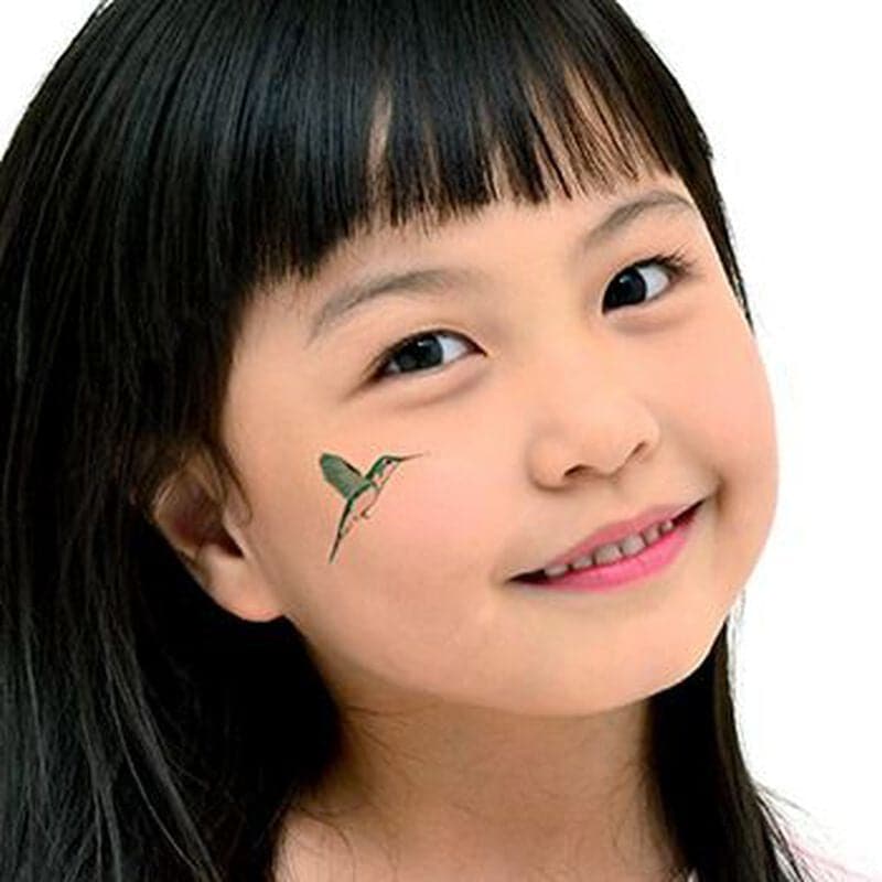 hummingbird temporary tattoo on cheek